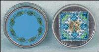 Plumed Peacock Tin with tiny needlebook show in tin Plumed Peacock Tin with tiny needlebook show in tin